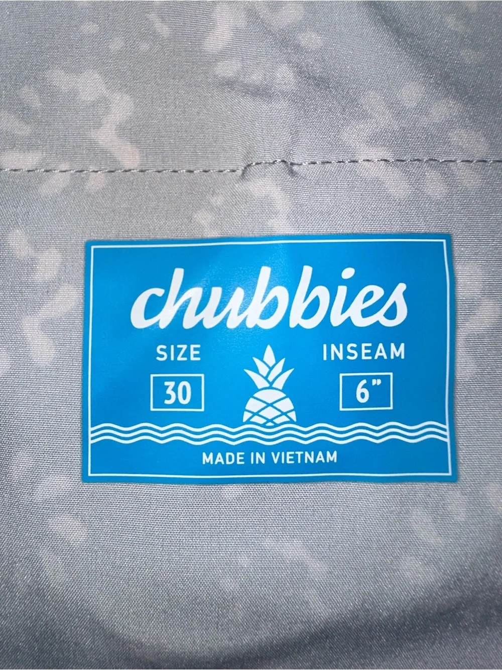 Chubbies Light Gray Floral Swim Shorts with Teal Trim